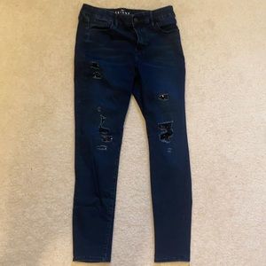 Distressed embellished jeans